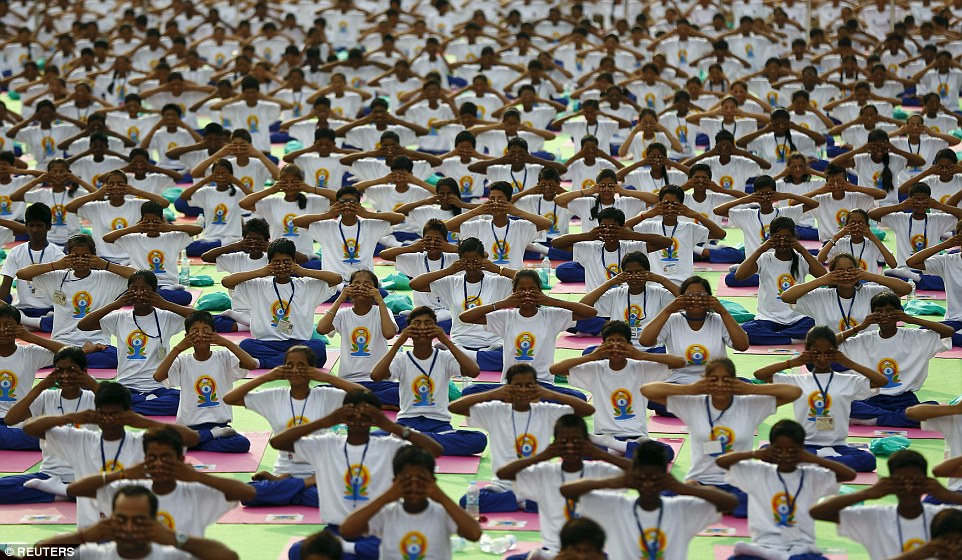 Thousands took part in mass practices like this group taking part in a breathing exercise in new Delhi, India