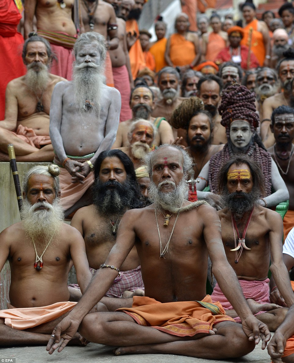 Crowds of holy men gather at the Kamakhya temple in Guwahati city, India